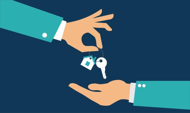 Property manager handing over keys to a Winchester Virginia rental home